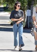 Lucy Hale spotted in a black 'Stardust' T-shirt and wide-leg jeans while out with a friend in Los Angeles