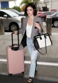 Lucy Hale spotted in a grey blazer and jeans as as she arrives to catch a flight out of LAX in Los Angeles