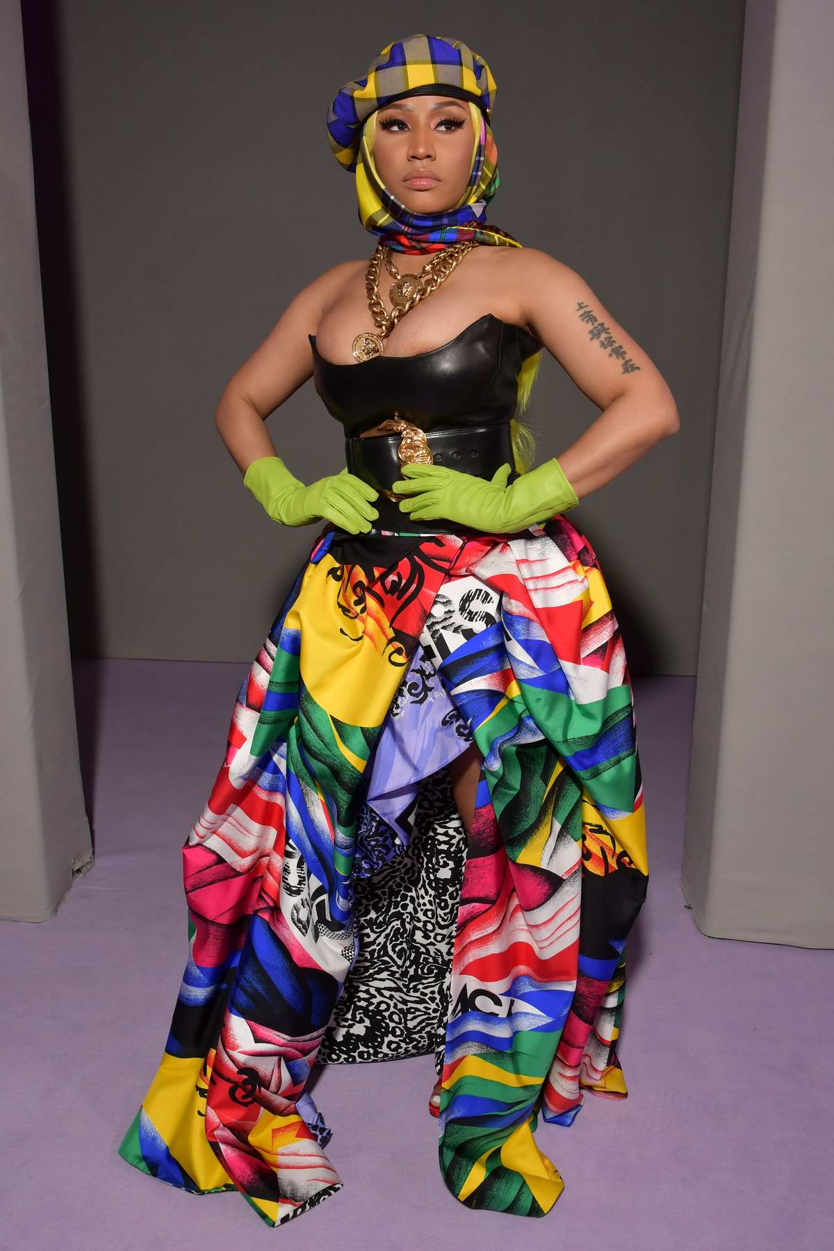nicki minaj rocks a colorful ensemble while attending versace show, ss19  during milan fashion week in milan, italy-210918_6