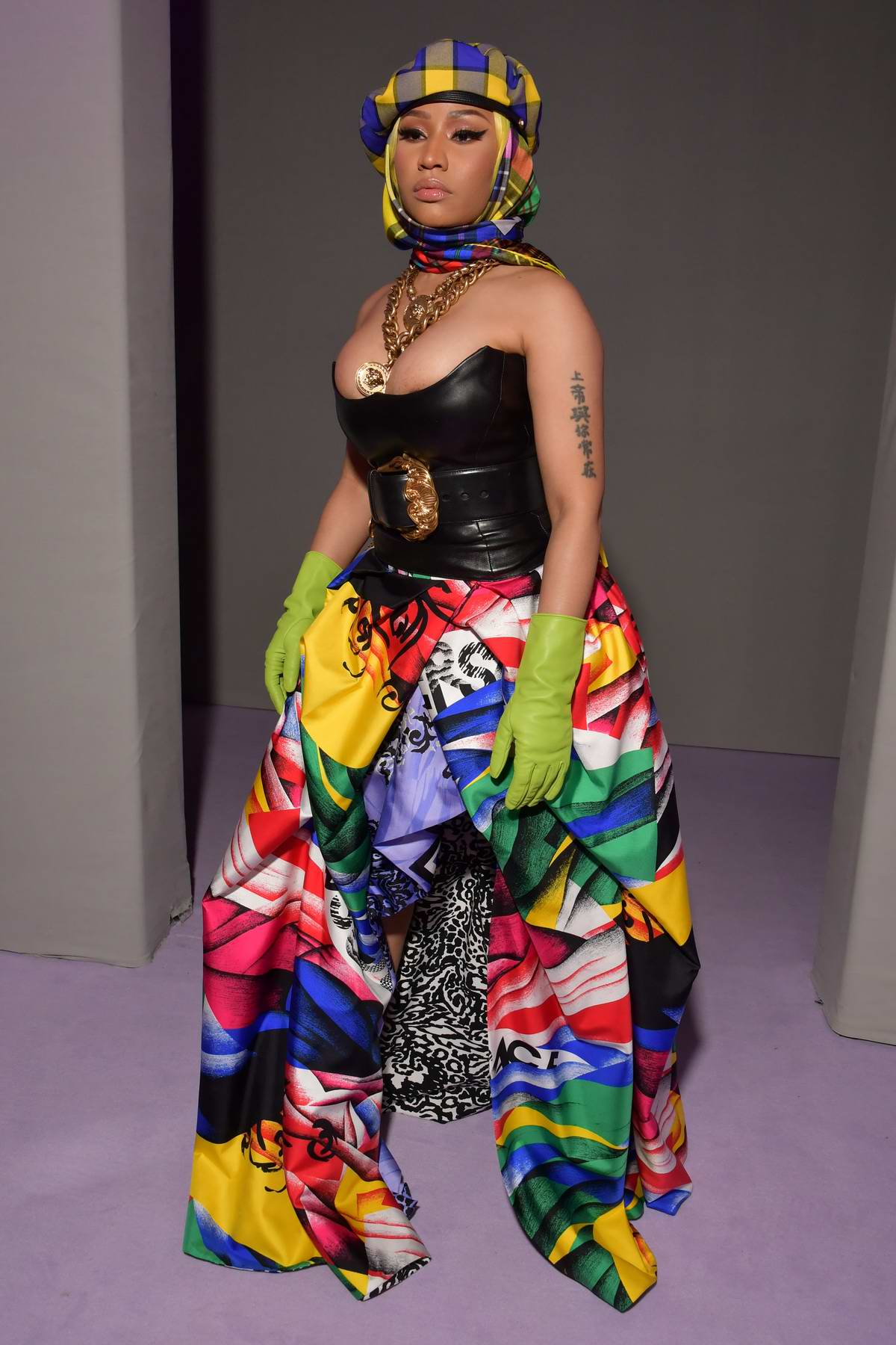 Nicki Minaj rocks a colorful ensemble while attending Versace Show, SS19  during Milan Fashion Week in