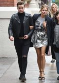 Sienna Miller enjoys a stroll with a friend during during the Toronto International Film Festival (TIFF 2018) in Toronto, Canada