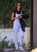 Alessandra Ambrosio says a quick goodbye to her son as she leaves for the LAX airport in Los Angeles