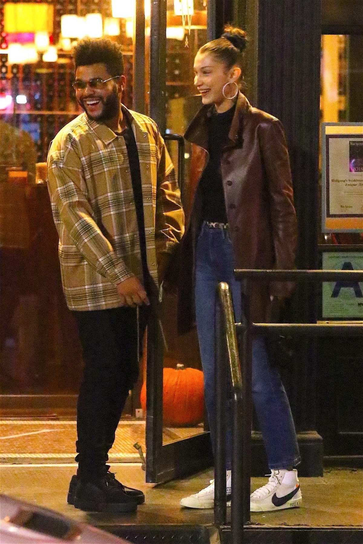 Bella Hadid And The Weeknd Take Late Night Pier Walk Photos