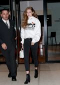 Gigi Hadid steps out in her 'Fashion Month Tour' sweatshirt as she heads to dinner at Raoul's in New York City