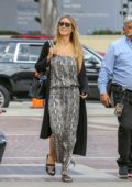 Heidi Klum wearing snakeskin print dress as she arrives to tape 'America's Got Talent' in Los Angeles