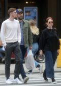 Julianne Moore and Bart Freudlich are spotted out with their son Caleb in SoHo, New York City