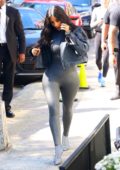 kim kardashian rocks dark grey leather bodysuit with matching