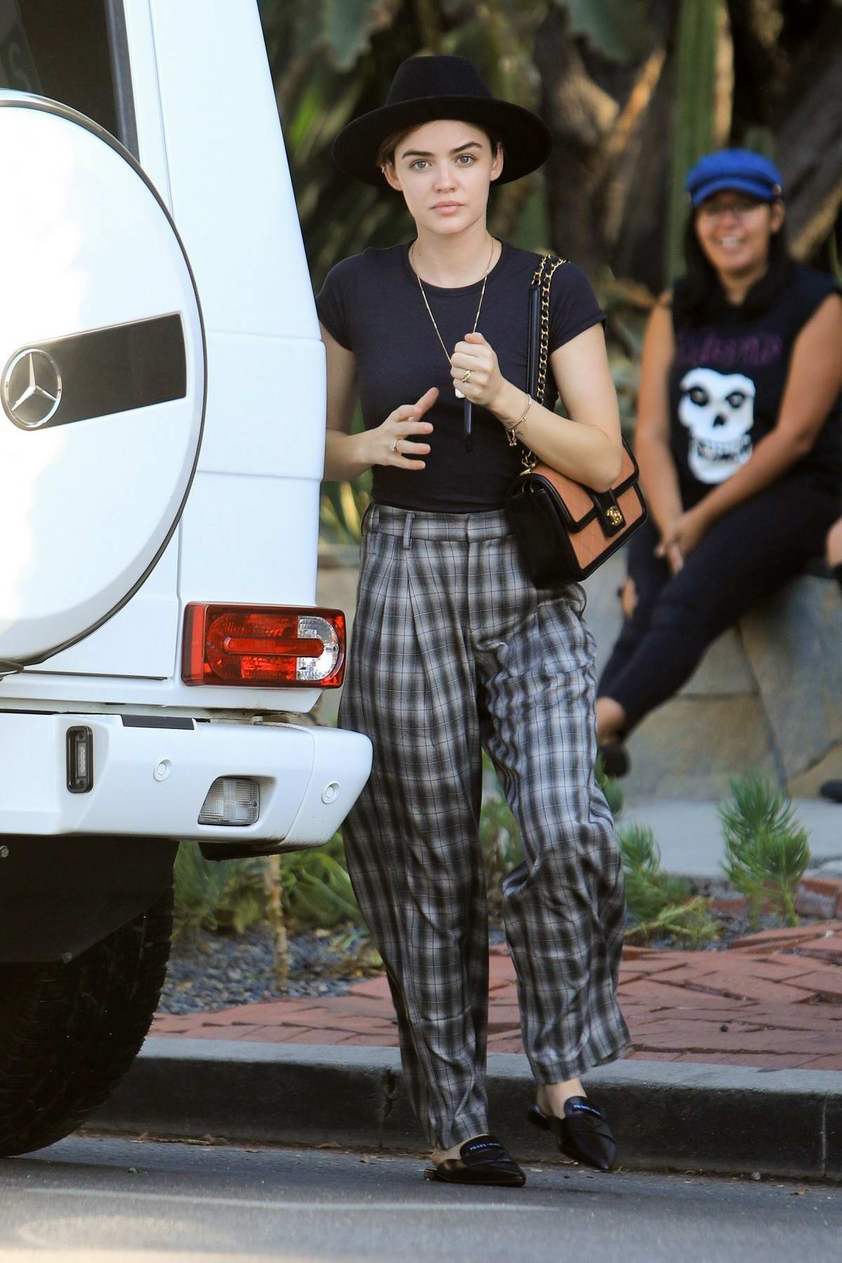 Emma Roberts spotted in a white Adidas sports bra and leggings while out  for coffee with