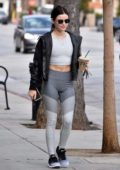 Lucy Hale wears a black leather jacket, grey top and leggings as she makes a coffee run in Studio City, Los Angeles