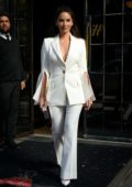 Olivia Munn wears a white pantsuit as she leaves the Bowery Hotel in New York City