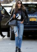 Alessandra Ambrosio is all smiles while out with friend wearing a graphic 'Michael Jackson' t-shirt, leather jacket and ripped jeans in Los Angeles
