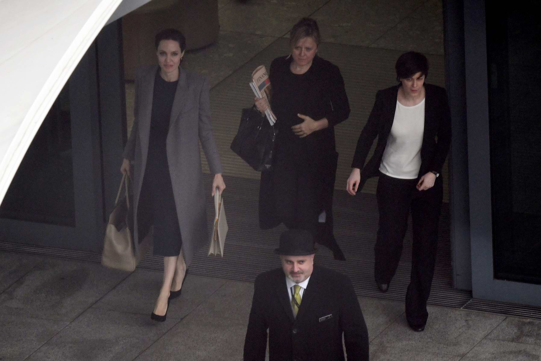 Angelina Jolie looks classy as ever while she arrives at the Heathrow  airport in London, UK