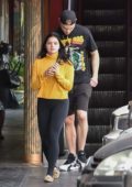 Ariel Winter spotted in a mustard yellow sweater paired with black leggings and leopard print loafers while out for lunch in Los Angeles