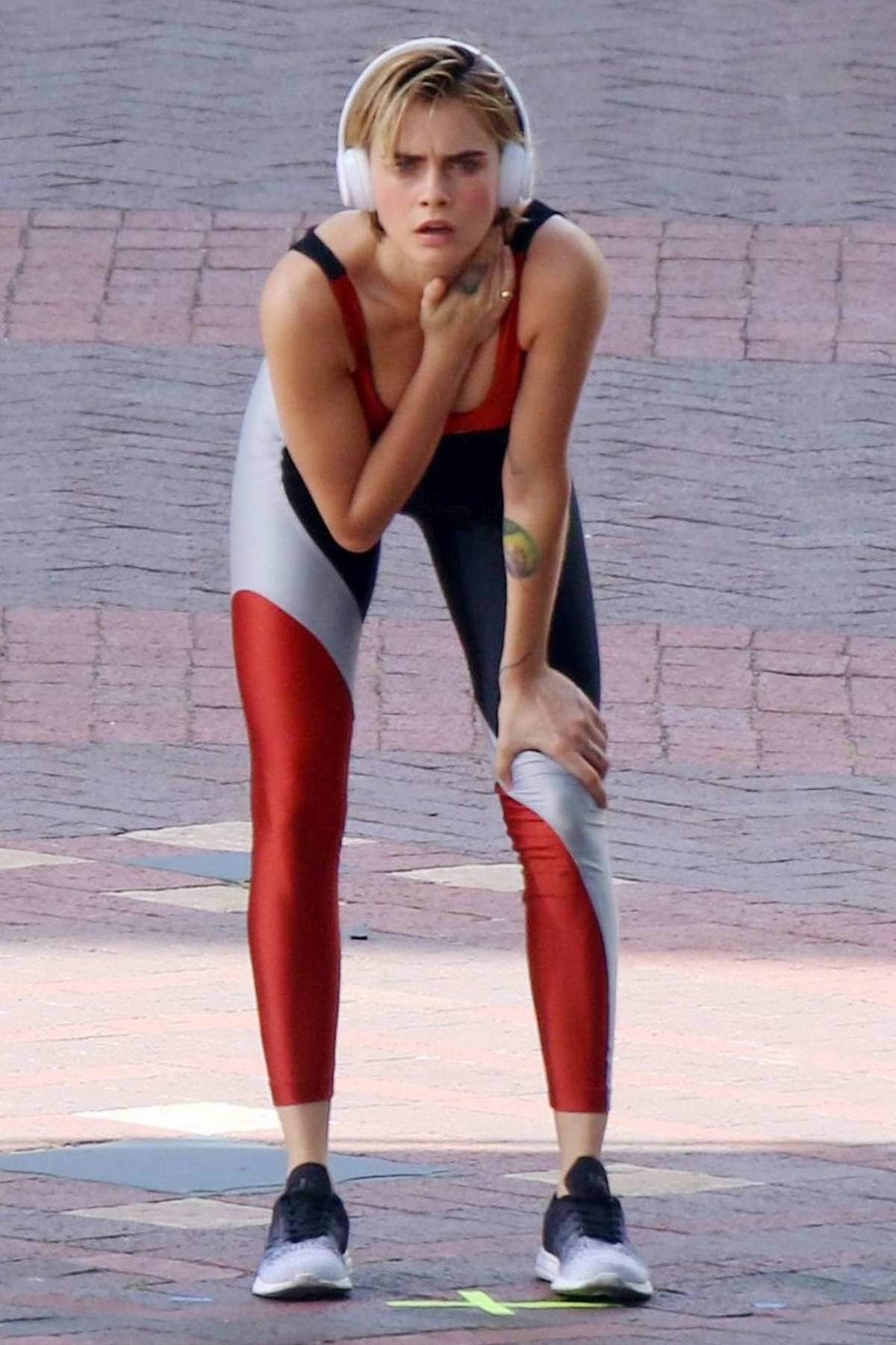 cara delevingne sports multi-colored activewear while filming a