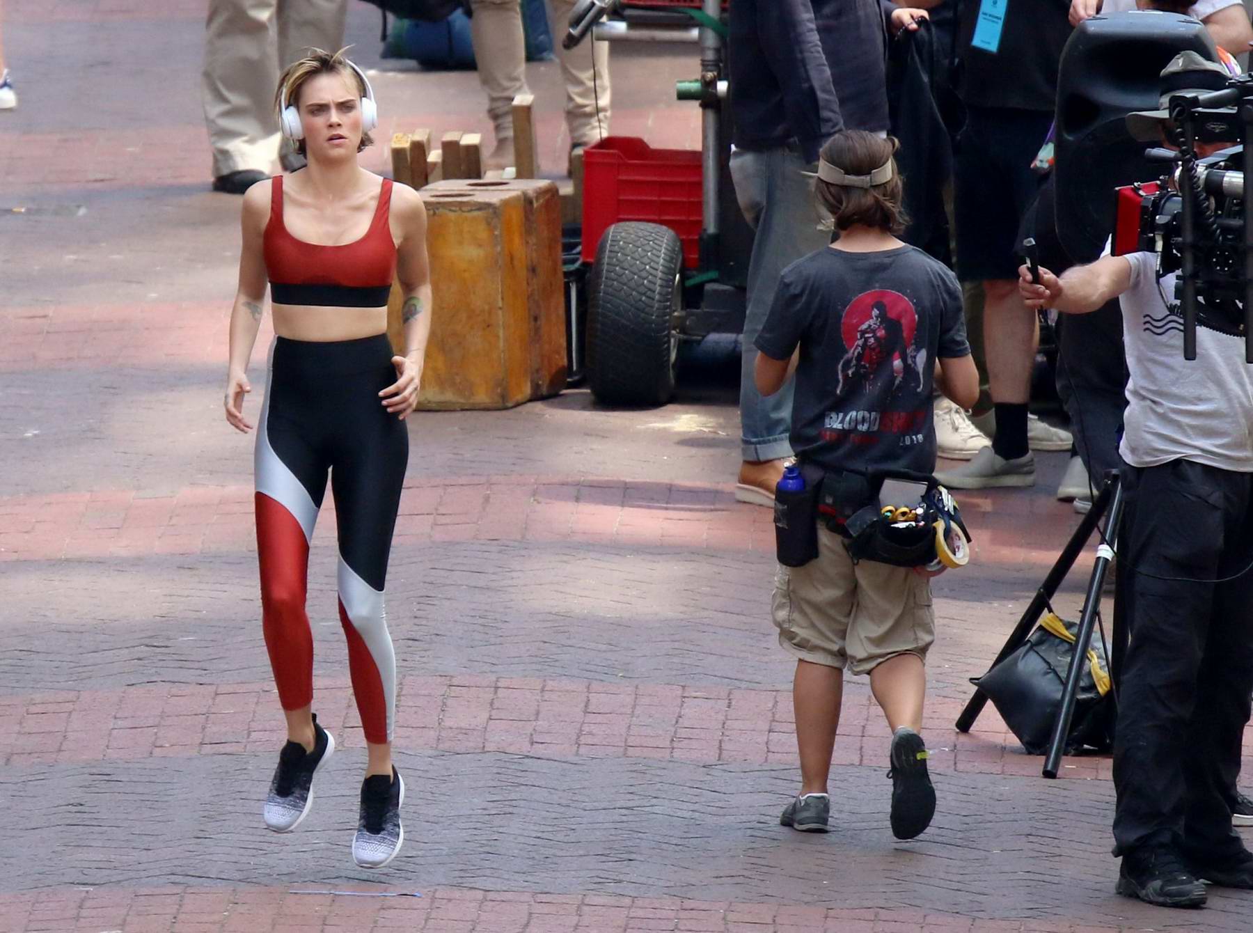 Ava Phillippe looks great in a red sports bra and leggings while