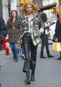 Elsa Hosk steps out in a patterned jacket, leather pants and boots in New York City