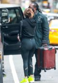 Jennifer Lopez seen wearing a cropped hoodie, leggings and neon trainers as  she heads to the gym in New York City