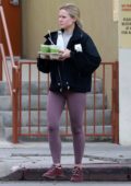 Kristen Bell rocks black jacket and purple leggings as she leaves the gym before stopping to get fresh juice in Los Feliz, California