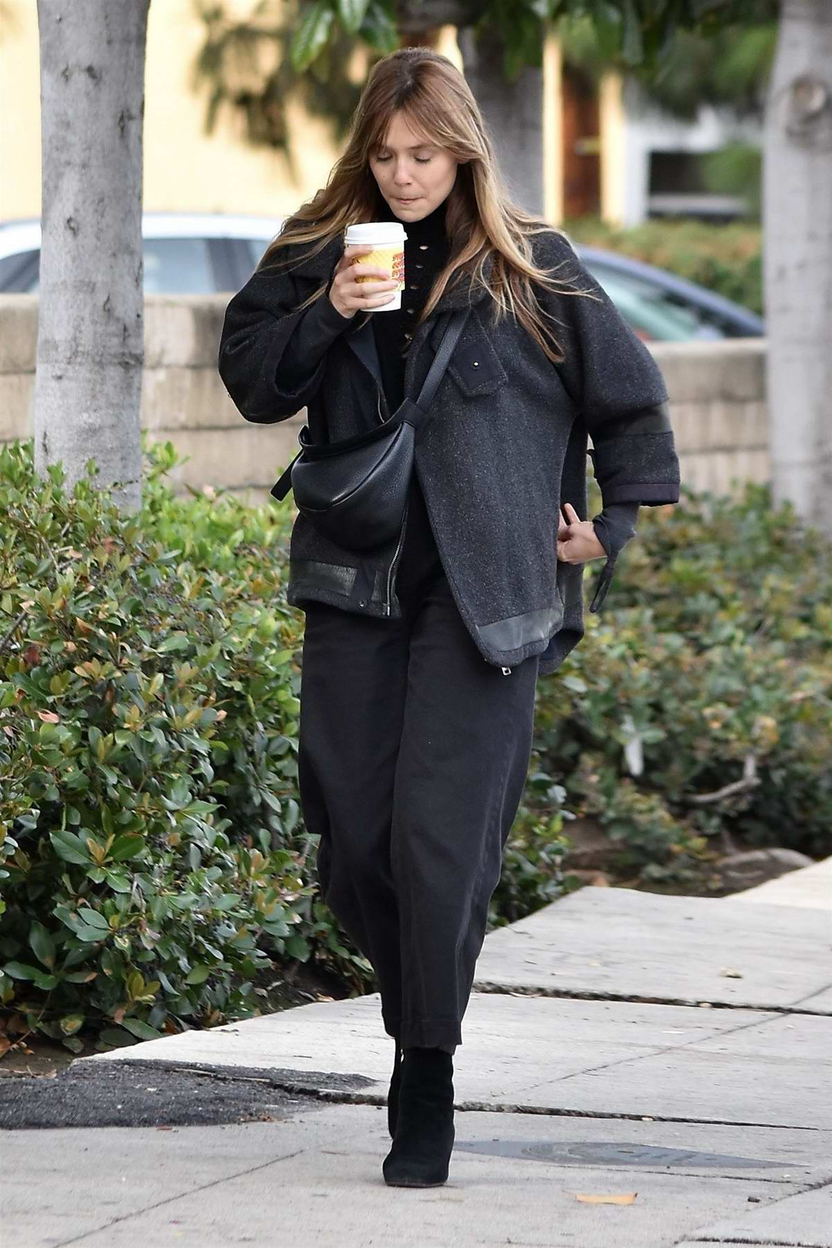 elizabeth olsen rocked all black while out to grab a coffee at alfred's ...