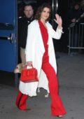 Cobie Smulders looks striking in a red outfit and white trench coat while visiting 'Good Morning America' in New York City