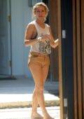 Elsa Pataky seen enjoying a bicycle ride wearing a tank top and brown shorts in Byron Bay, Australia