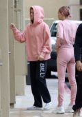 Hailey Baldwin Bieber and Justin Bieber wore matching pink outfits while stopping by West Valley Medical Center in Encino, California