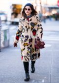Jenna Coleman wears a sketched fur coat while out in the East Village in New York City