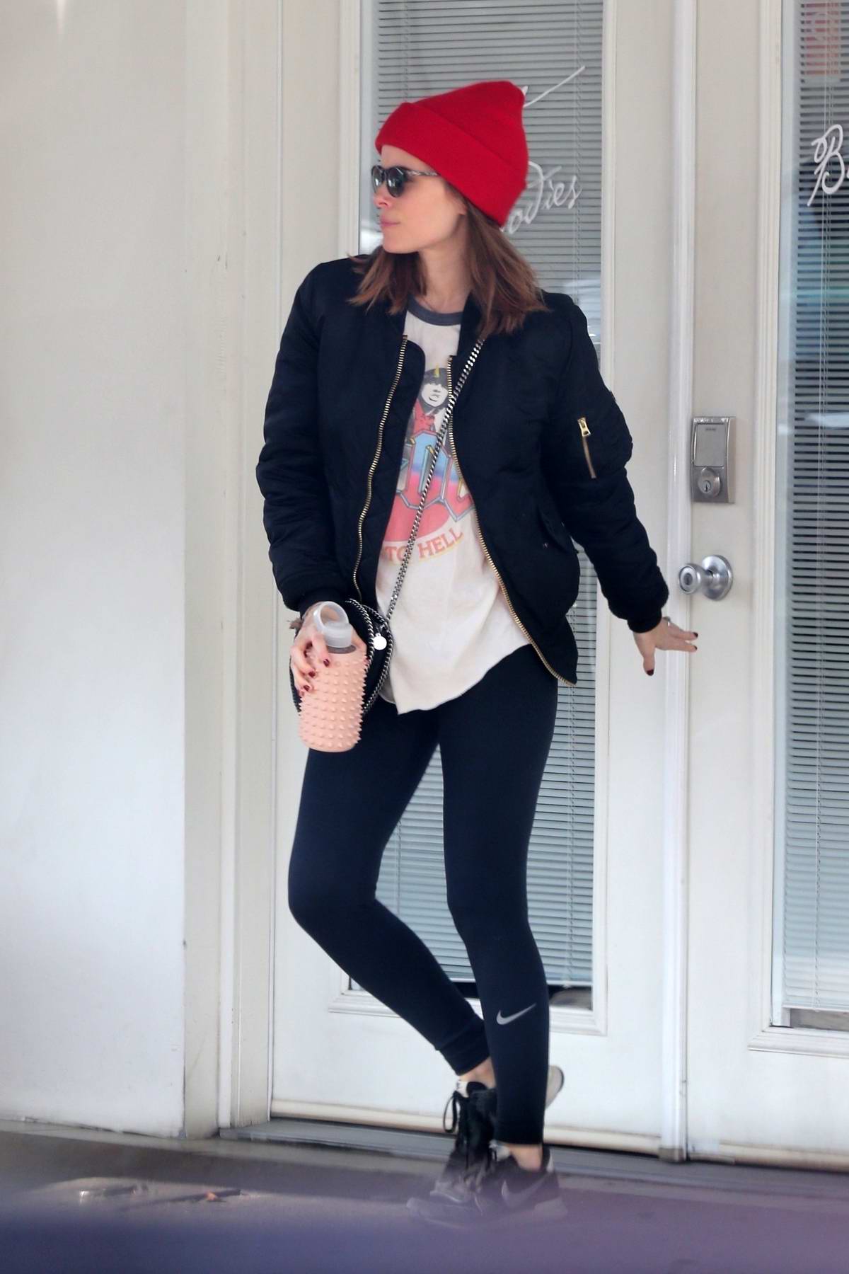 Kate Mara seen wearing a fur-lined denim jacket and black leggings as she  leaves after