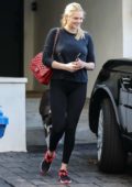 Kate Upton wears a black top and black leggings as she leave Ben Bruno's gym after her morning workout in Beverly Hills, Los Angeles