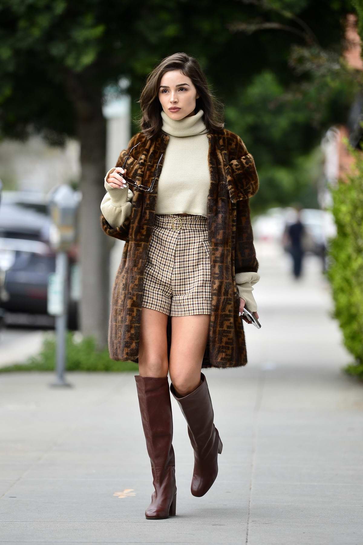 Olivia Culpo looks super stylish in a Fendi fur coat paired with a