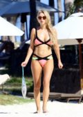 Una Healy wears a multi-colored bikini while enjoying the beach with new boyfriend David Breen during her holiday in Mauritius