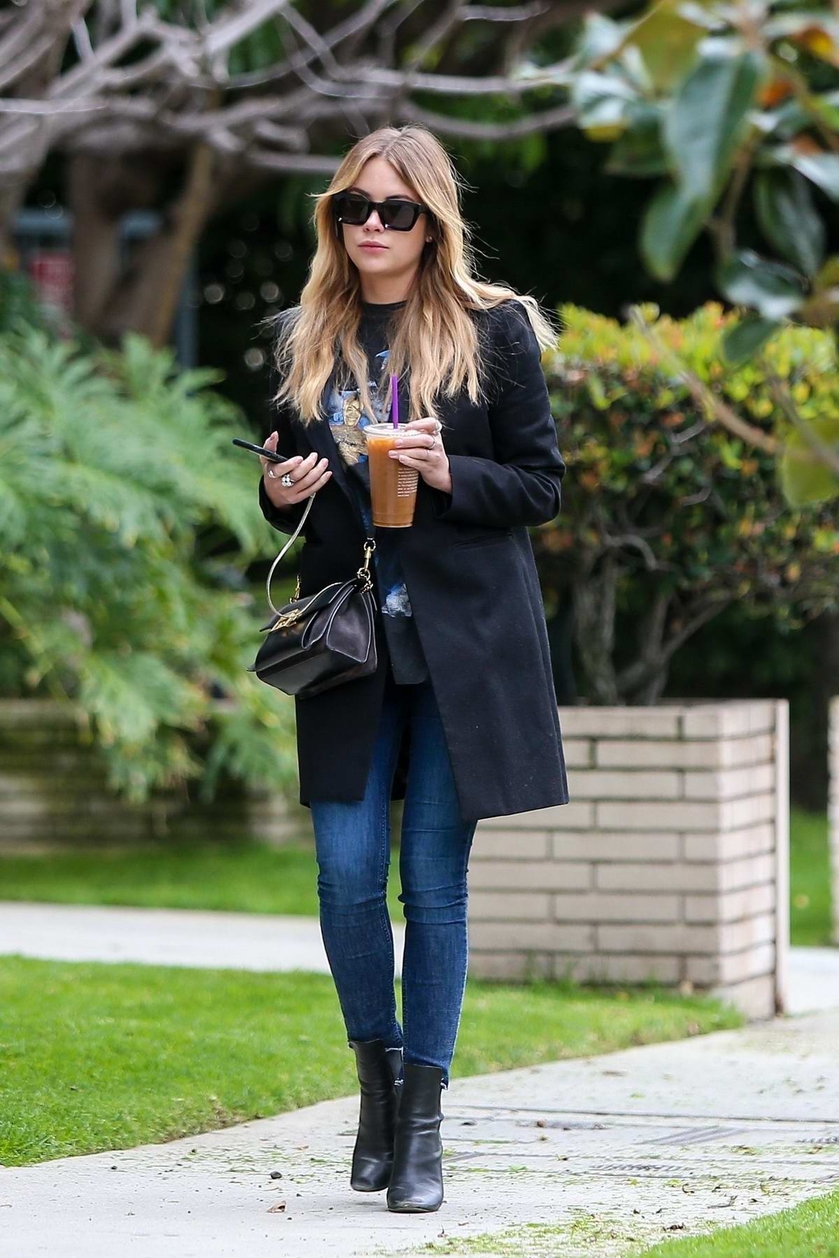 Ashley Benson enjoys an iced coffee on her way to the salon in Los Angeles