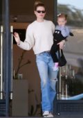 Behati Prinsloo enjoys some shopping with her daughter at Barneys New York in Beverly Hills, Los Angeles