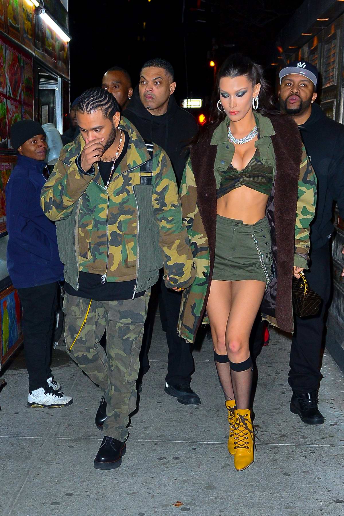 Bella Hadid and The Weeknd steps out in matching camo outfits while heading  to The Weeknd's