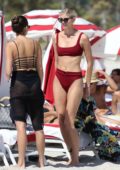 Devon Windsor dons a red bikini while enjoying a beach day at Miami Beach, Florida