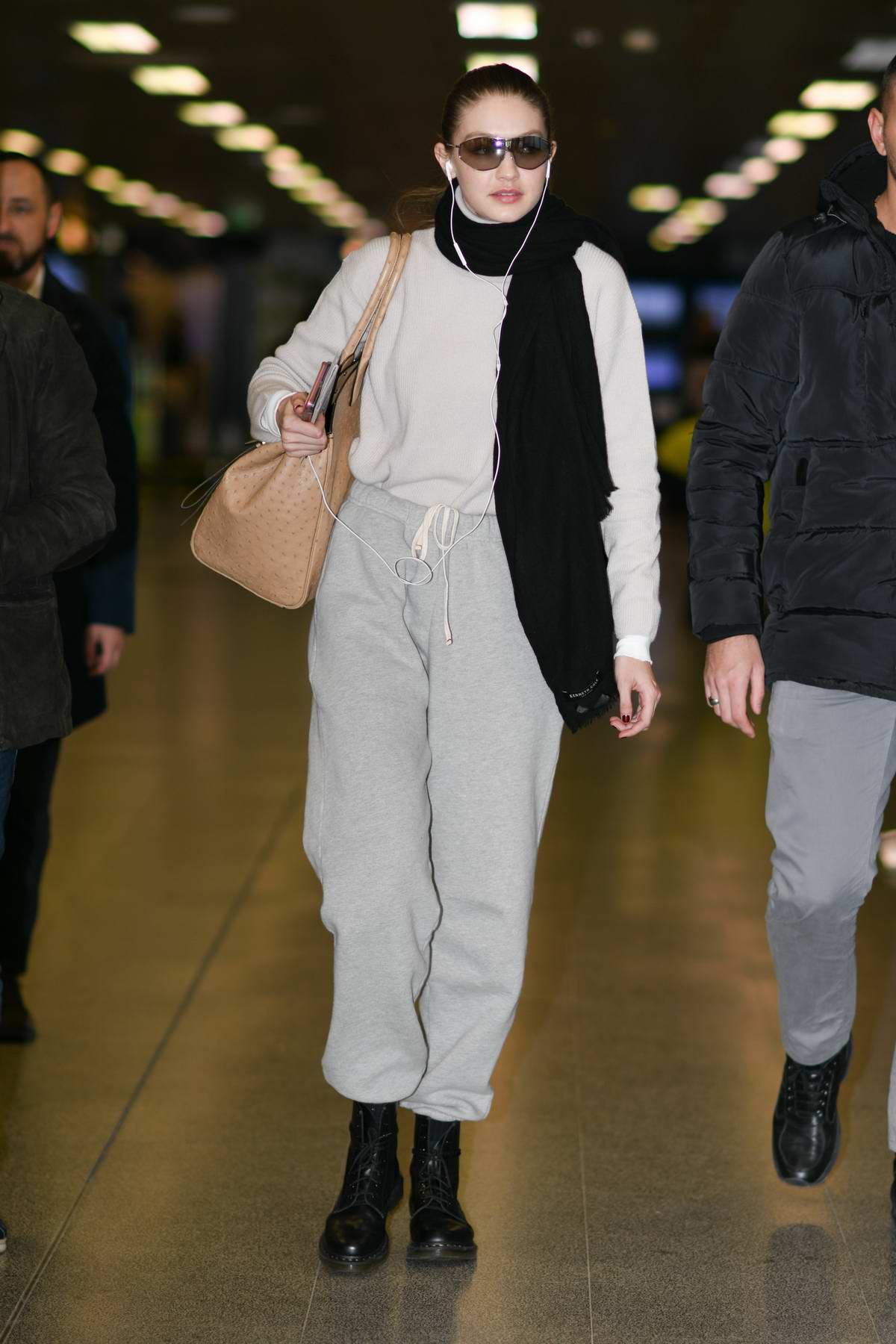Zendaya arrives in a red hoodie at JFK Airport in New York City
