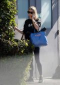 Gwyneth Paltrow wore a black sweatshirt and blue leggings while running errands in Los Angeles
