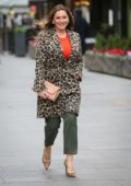 Kelly Brook wears a leopard print coat with matching heels as she arrives at Global Radio studios in London, UK