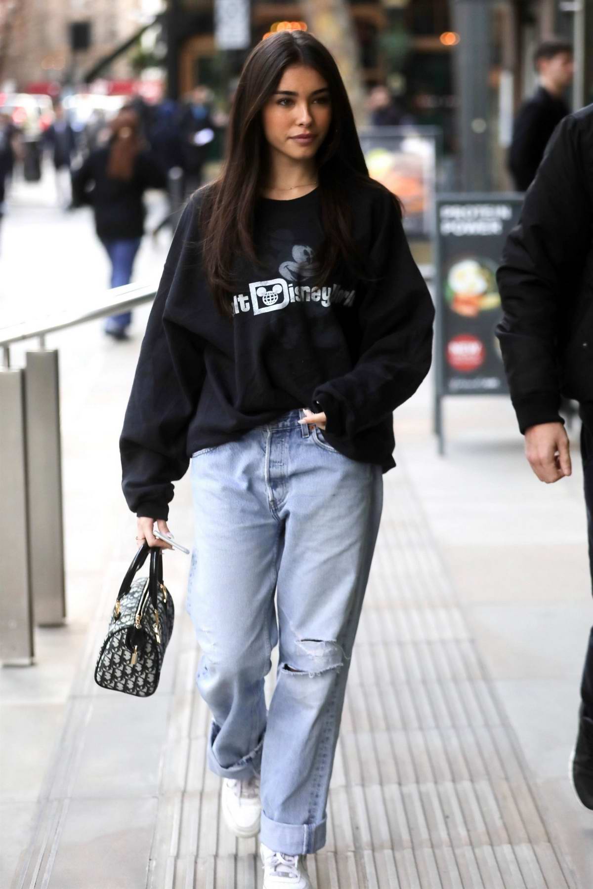 madison beer keeps it casual with a sweatshirt and jeans as she arrives ...