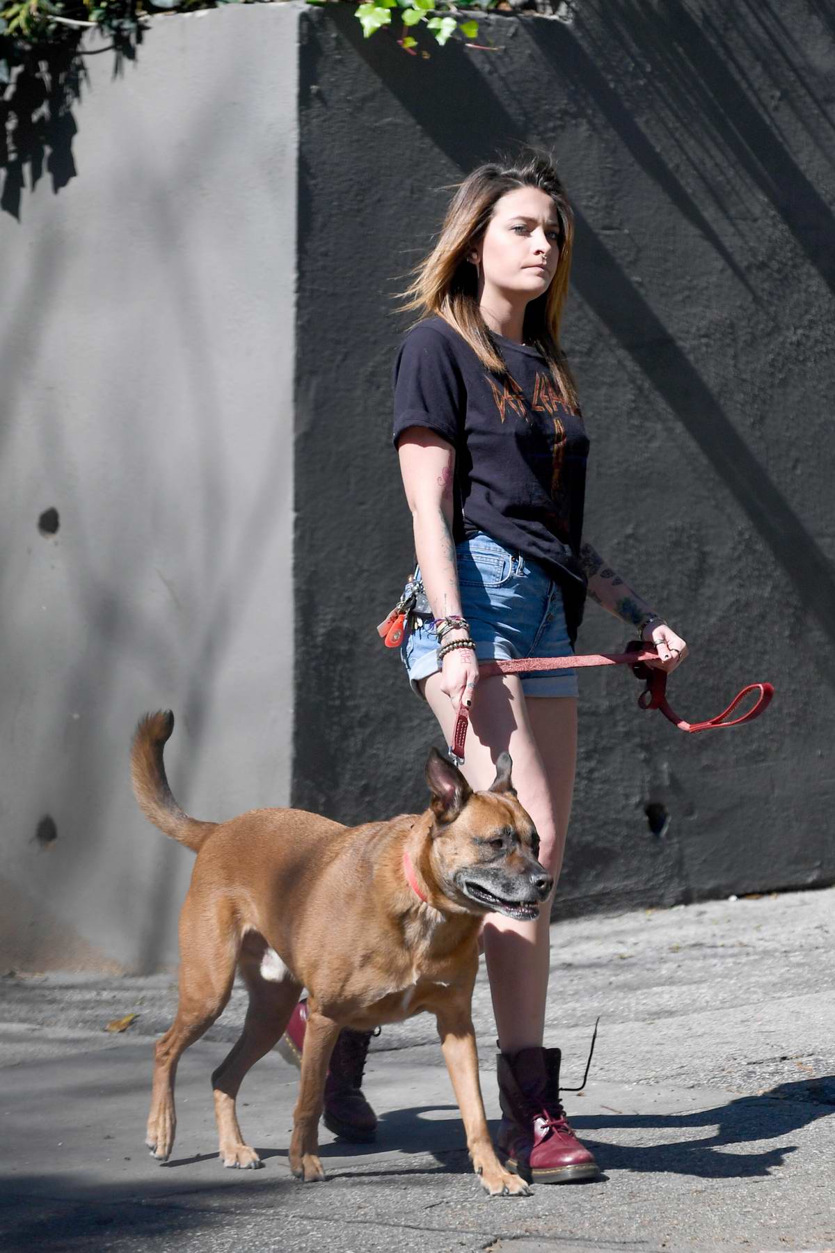 paris jackson steps out in a tee and denim shorts to walk her dog