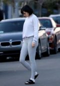 Rumer Willis sports a white sweatshirt and grey leggings while heading for a workout in her Tesla in Los Angeles