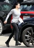 Ariel Winter wears a grey top and black leggings as she leaves after a  recording session