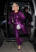 Bebe Rexha stuns in a shimmering purple jumpsuit as she arrives at Diana Ross' 75th birthday bash at Warwick in Hollywood, California