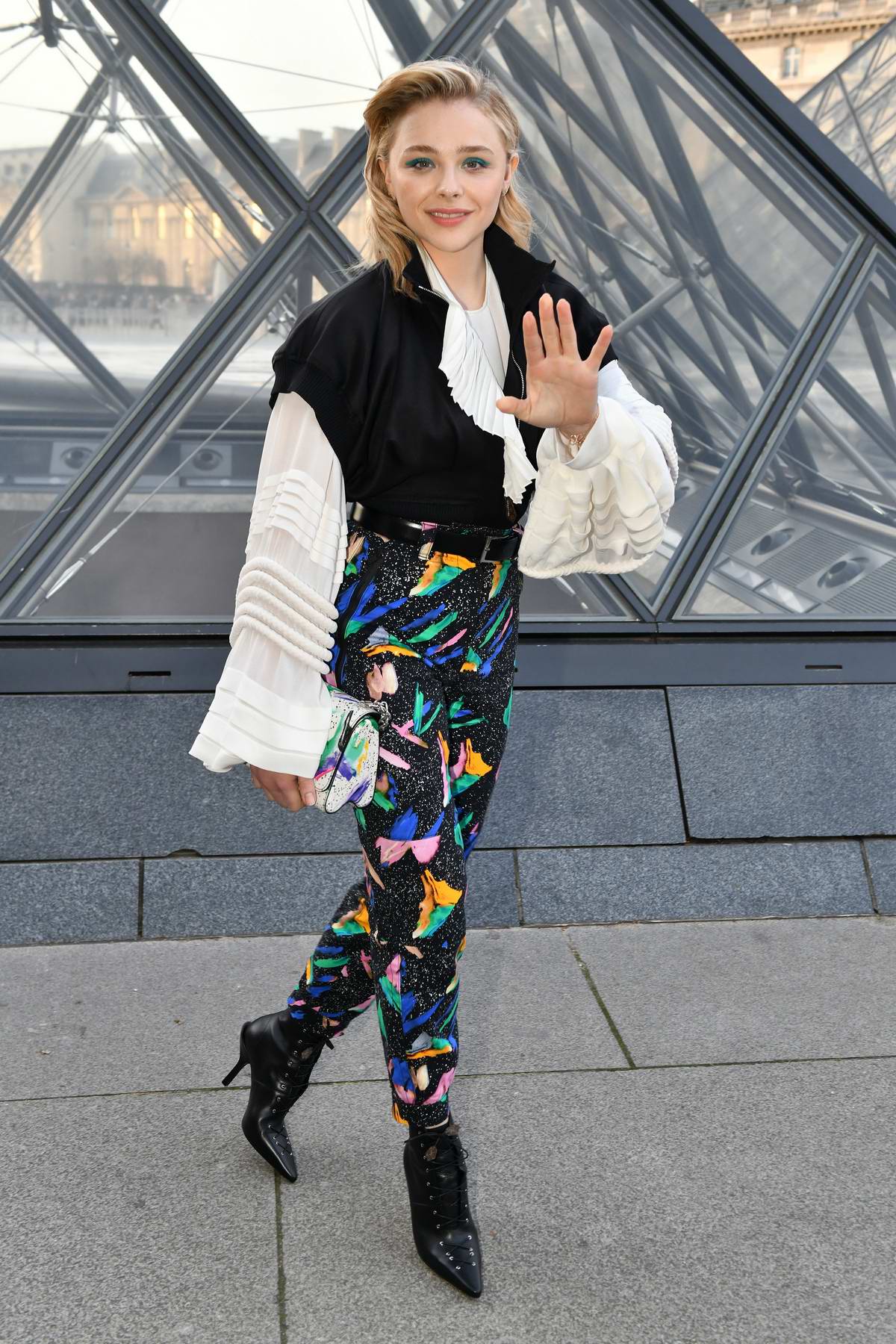 Chloe Grace Moretz turns heads at Louis Vuitton Paris Fashion Week show