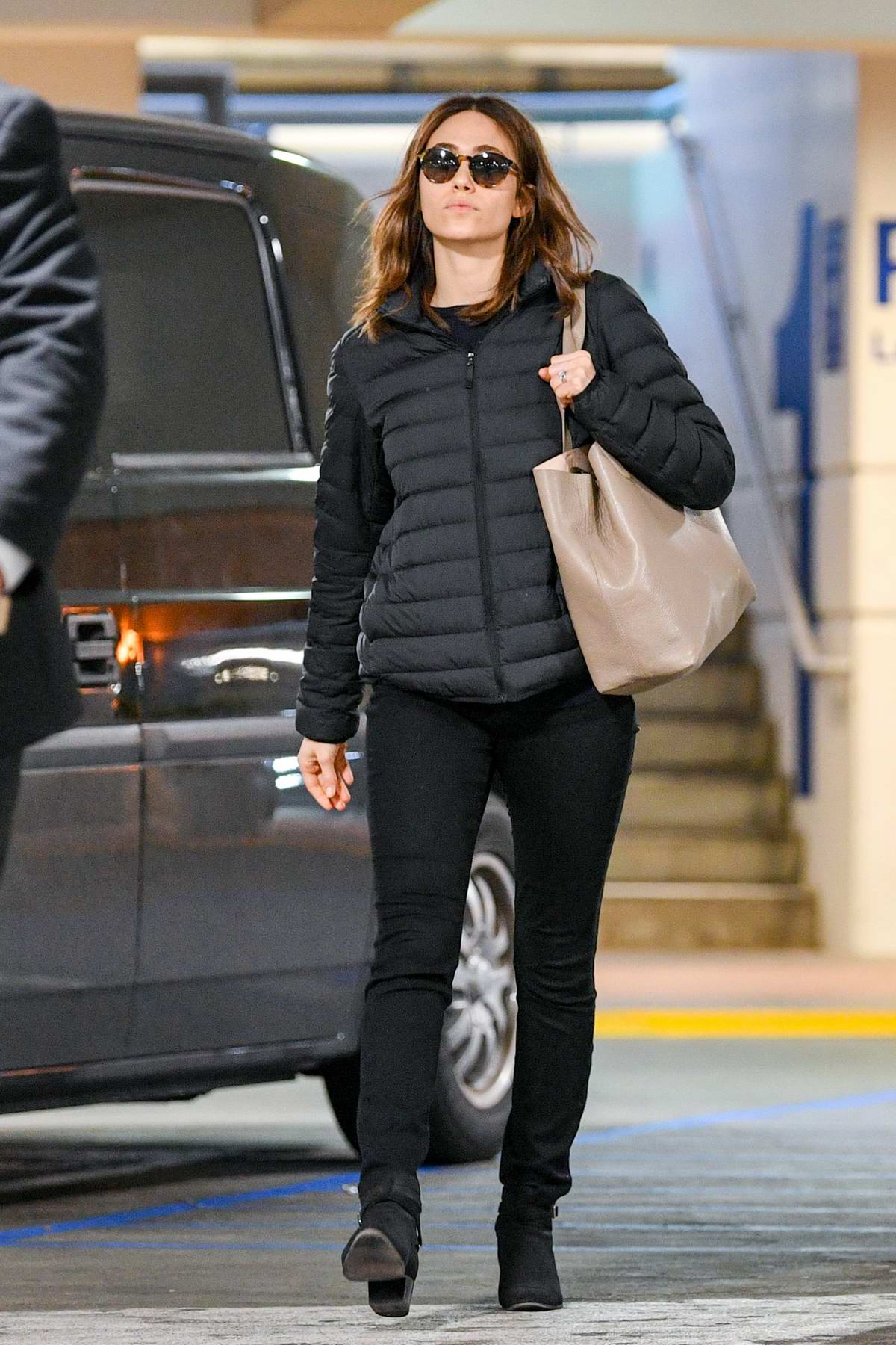 emmy rossum dons all black as she touches down at lax airport in los ...