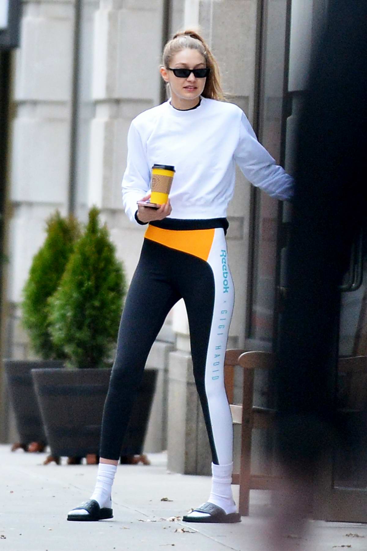 Gigi Hadid sports her own brand of Reebok tights while exiting a gym in New  York