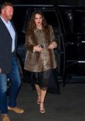 Keira Knighley steps out wearing a leopard print coat over a black dress while out promoting 'The Aftermath' in New York City