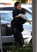 Kylie Jenner takes her daughter to a birthday party in Encino, California