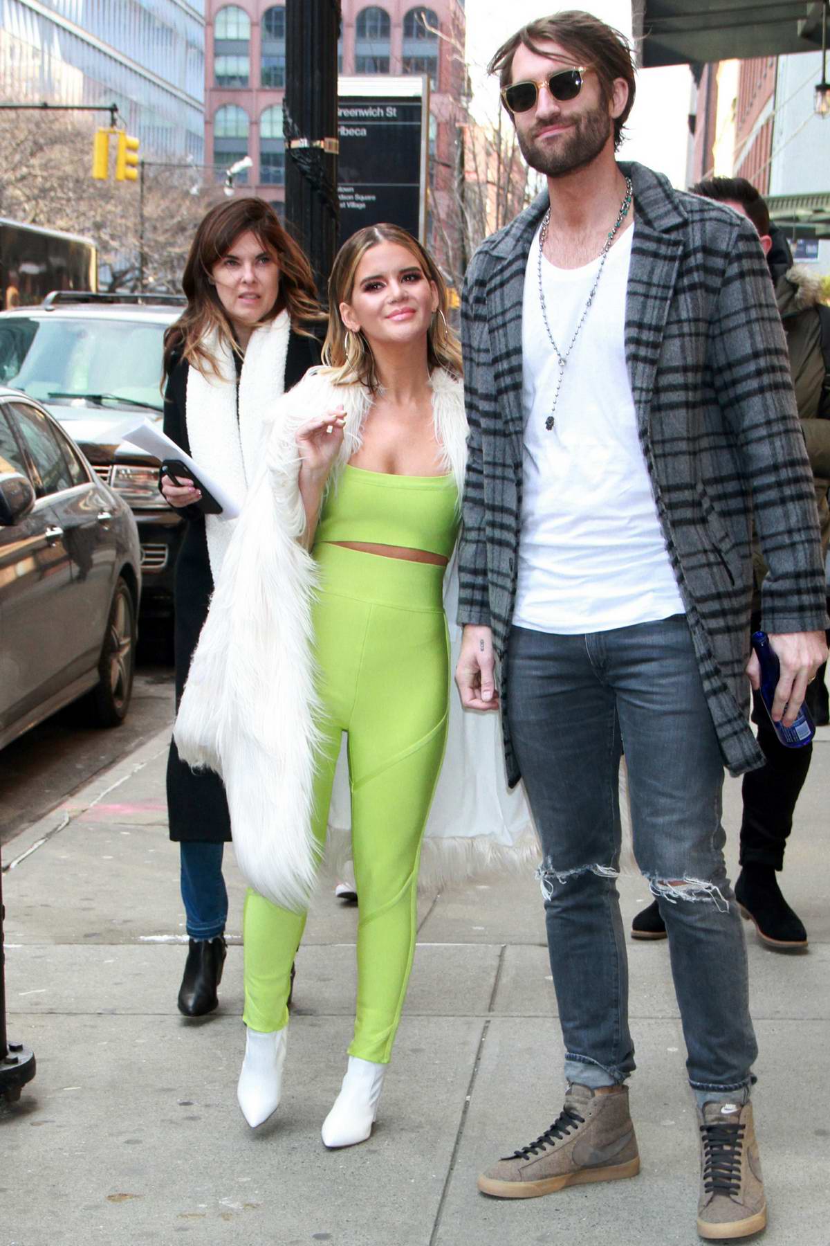 Maren Morris spotted in a lime green jumpsuit with a white fur coat ...