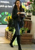 Rosario Dawson picks up a rotisserie chicken from Whole Foods in Beverly Hills, Los Angeles